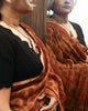Black wool scallop neck sweater in 100% pure wool styled as a blouse with saree.
