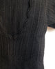 close-up of the knitted sweater having crocheted edges in 100% pure wool.
