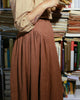Close-up of textured seersucker cotton fabric on a long skirt with smooth polysilk lining.