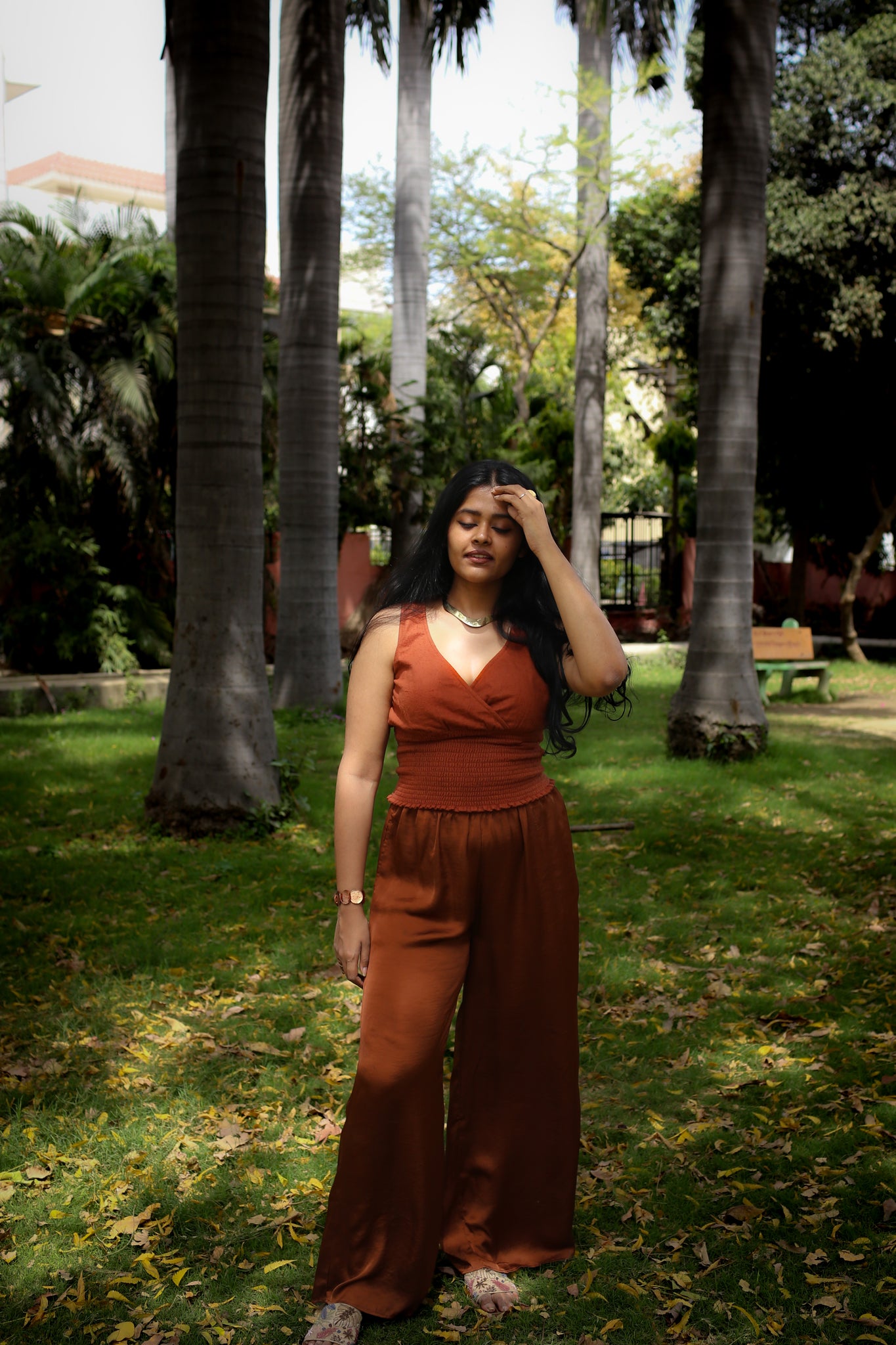 Full view of burnt ochre earthy cotton top paired with flowy trousers, ideal for breathable summer styling.