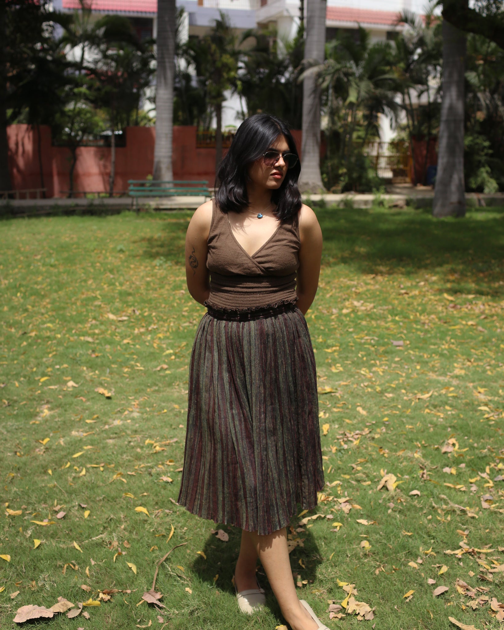 Side view of mossbark V-neck brushed cotton top with layered bust and structured fit.