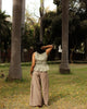 Flowy cotton co-ord set with pleated peplum top and wide leg pants, relaxed summer wear for women