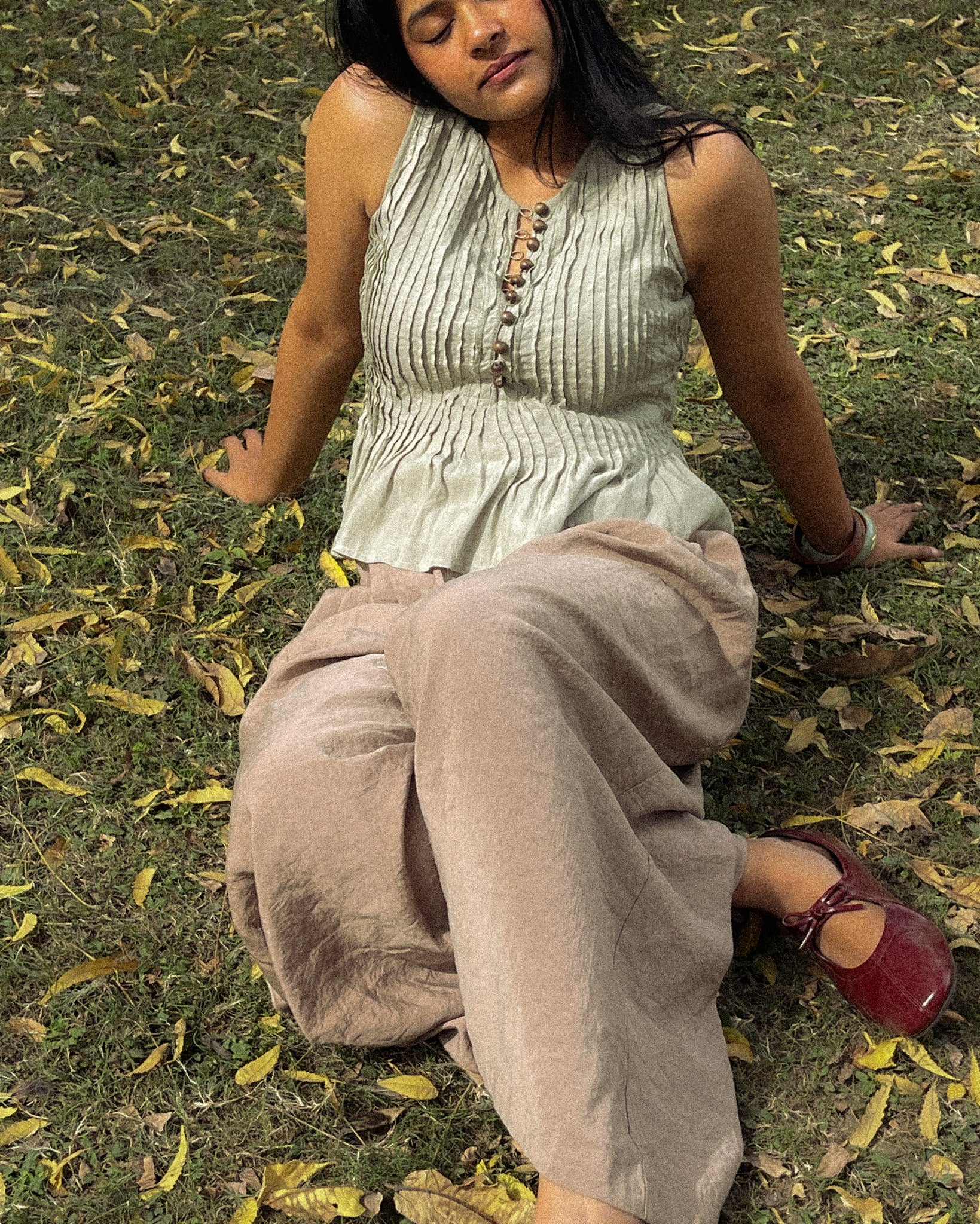 Flowy cotton peplum top in motion highlighting soft drape and airy summer feel
