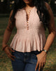Pleated bodice detail of cotton top with wooden buttons and subtle textured finish
